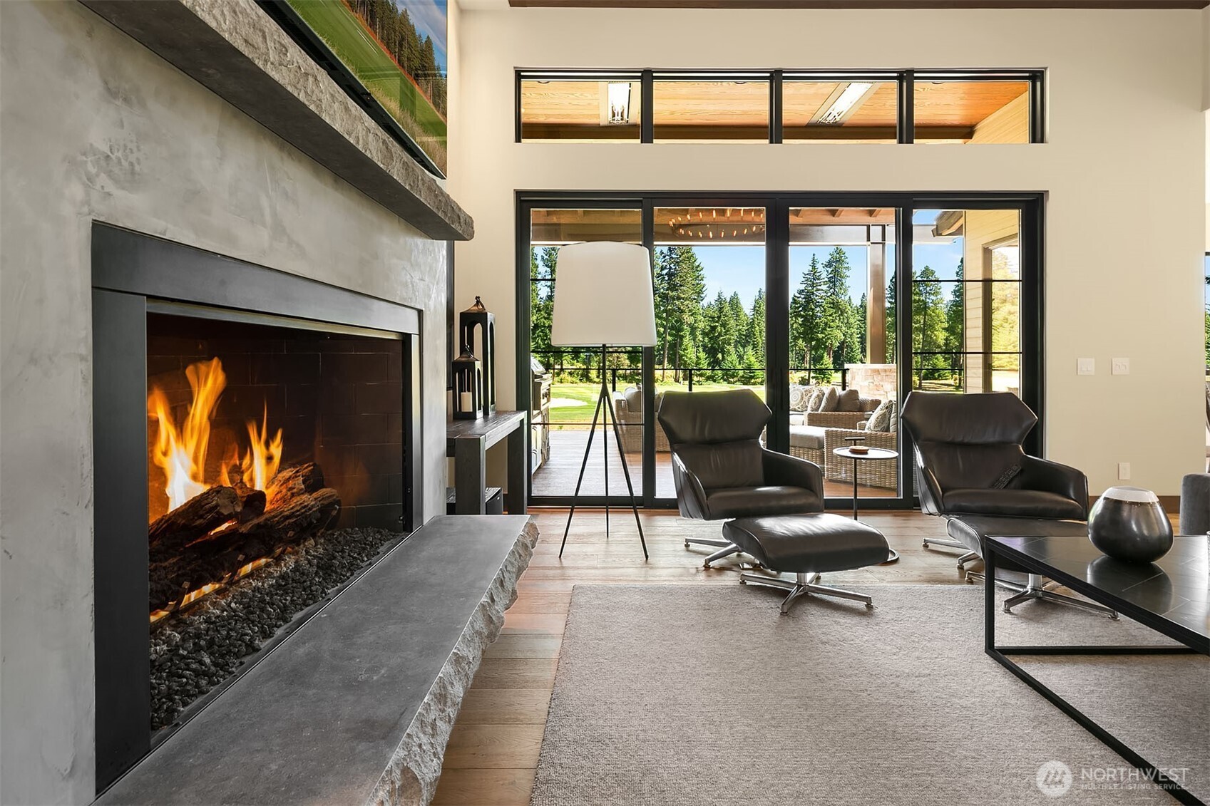 47 Frst Rdg Drive Cle Elum, WA 98922 - Photo 7 of 40 a living room with furniture tv and a fireplace