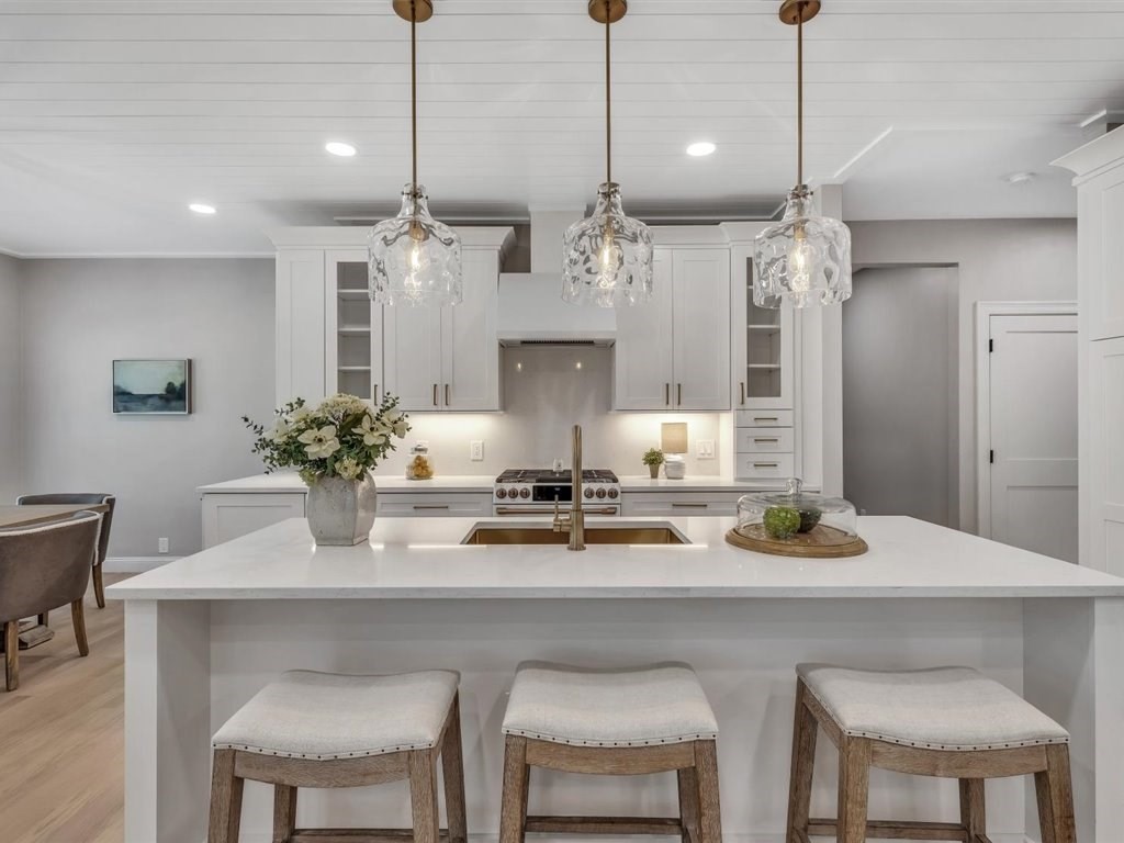 9 West Way Mashpee, MA 02649 - Photo 14 of 42 a kitchen with a table and chairs