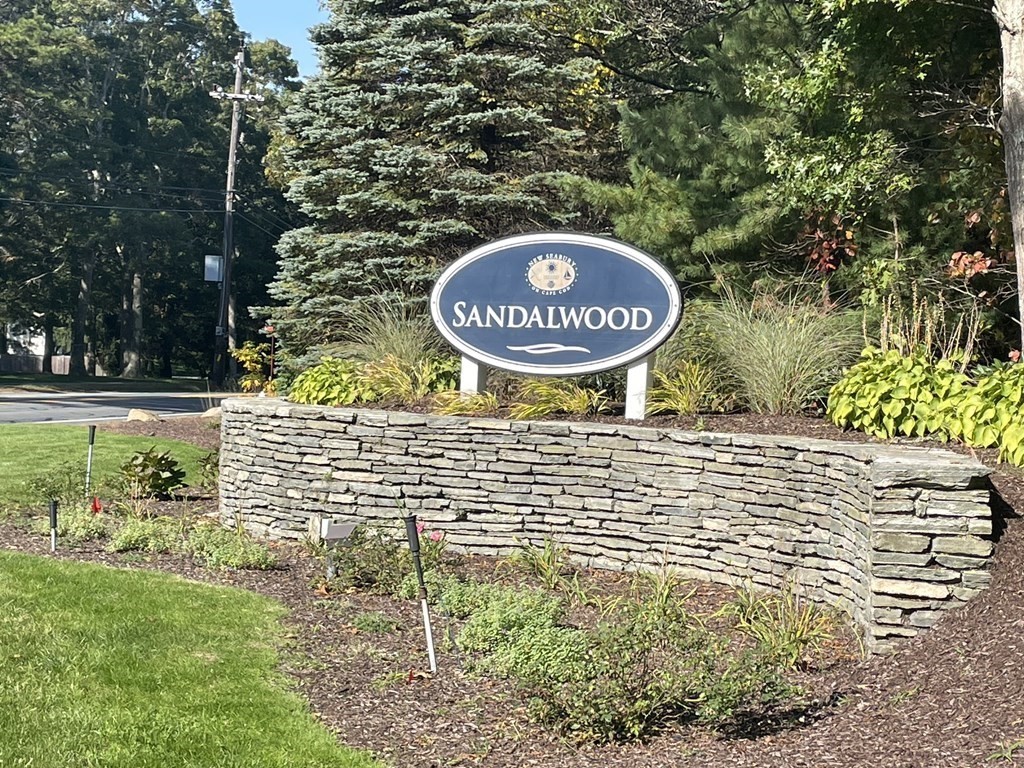 9 West Way Mashpee, MA 02649 - Photo 2 of 42 a sign that is on a brick wall