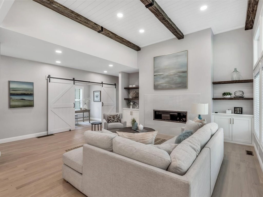 9 West Way Mashpee, MA 02649 - Photo 23 of 42 a living room with furniture and a fireplace