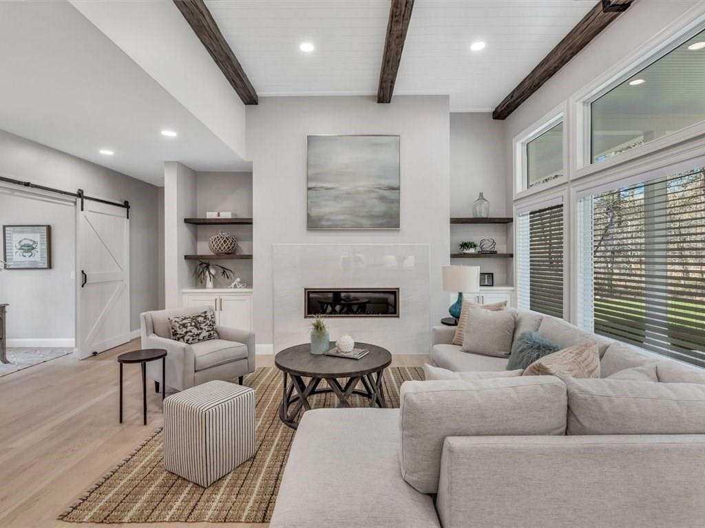 9 West Way Mashpee, MA 02649 - Photo 24 of 42 a living room with furniture and a fireplace