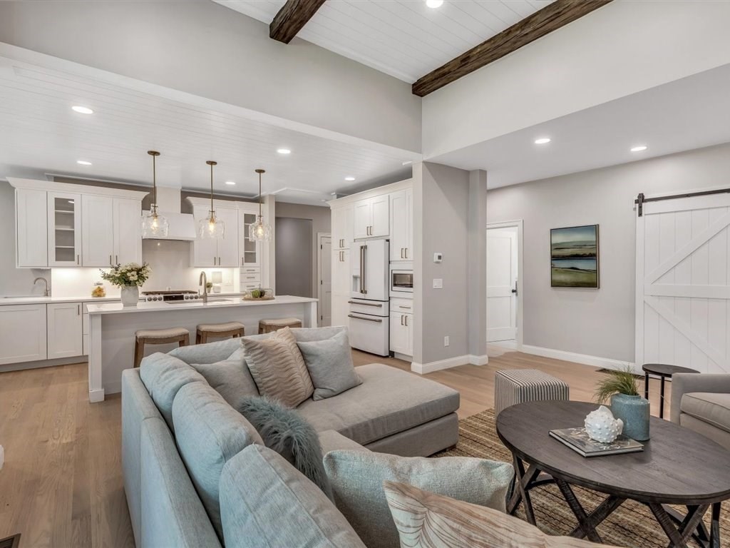 9 West Way Mashpee, MA 02649 - Photo 27 of 42 a living room with stainless steel appliances kitchen island granite countertop furniture and a view of kitchen