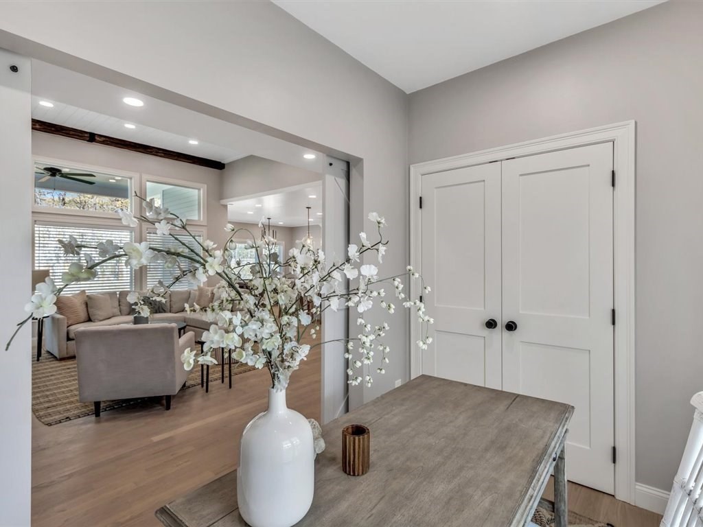 9 West Way Mashpee, MA 02649 - Photo 30 of 42 a living room with furniture and a chandelier