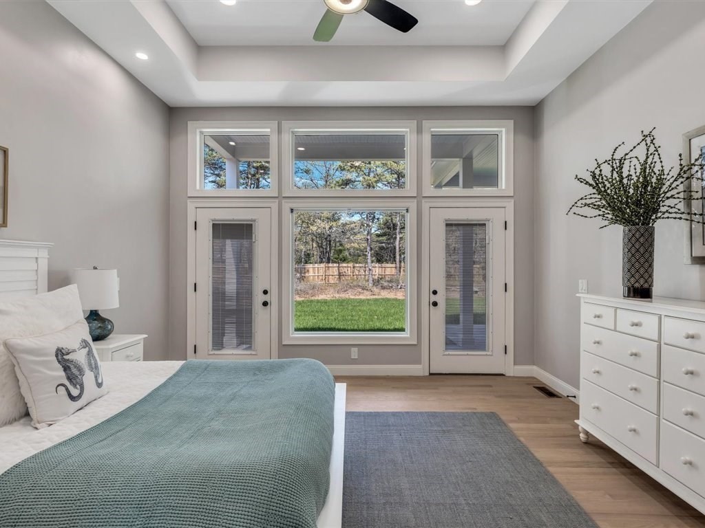 9 West Way Mashpee, MA 02649 - Photo 32 of 42 a bedroom with furniture and windows