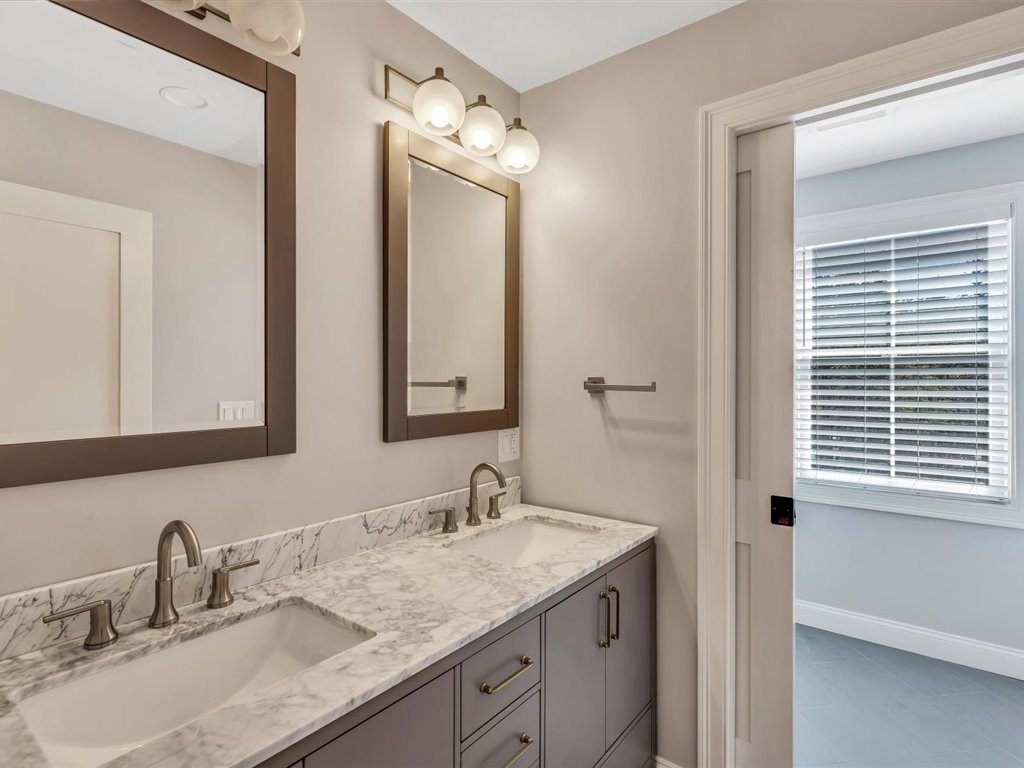 9 West Way Mashpee, MA 02649 - Photo 38 of 42 a bathroom with a granite countertop sink and a mirror
