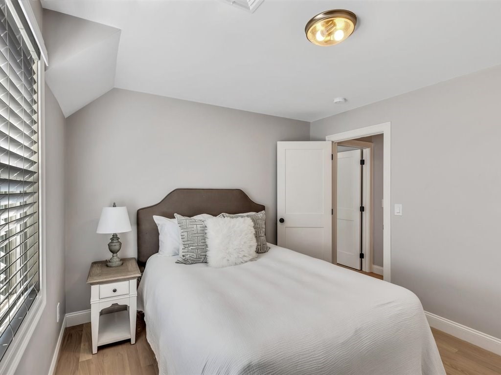 9 West Way Mashpee, MA 02649 - Photo 40 of 42 a bedroom with a bed and a window