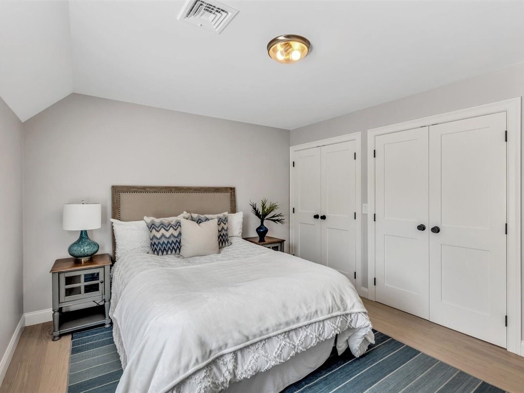 9 West Way Mashpee, MA 02649 - Photo 41 of 42 a bedroom with a bed and a table