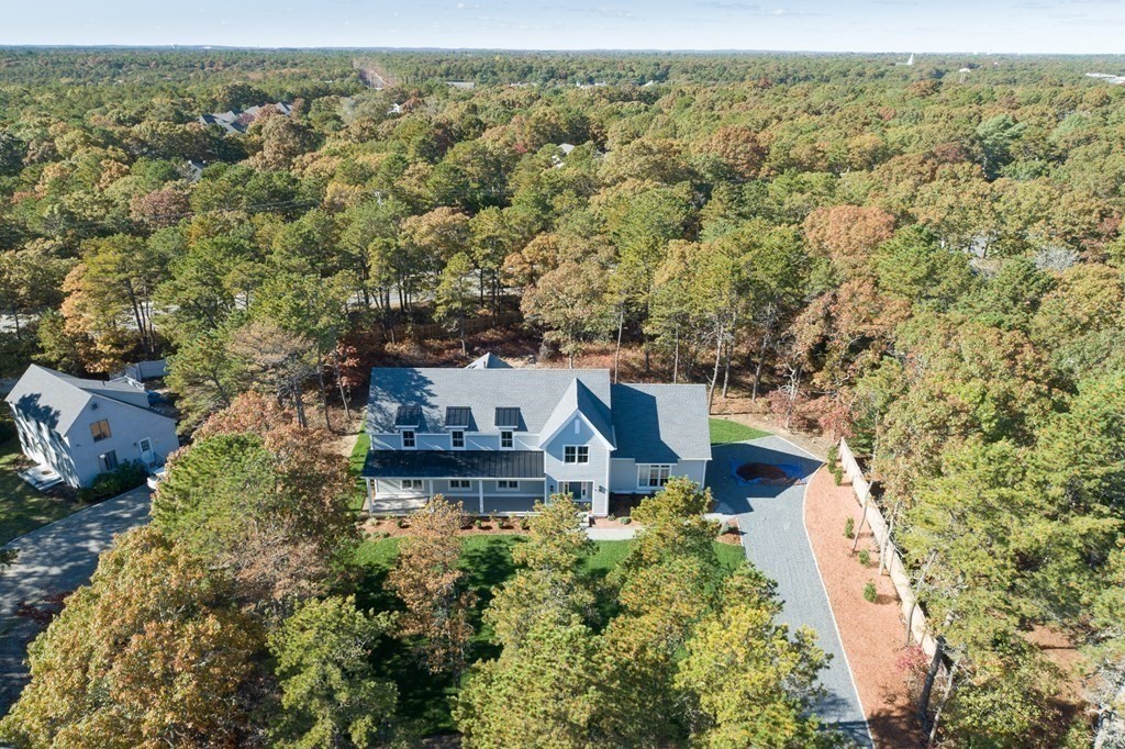 9 West Way Mashpee, MA 02649 - Photo 5 of 42 an aerial view of a house with a yard