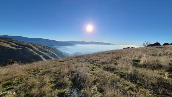 a view of a swimming pool with a mountain