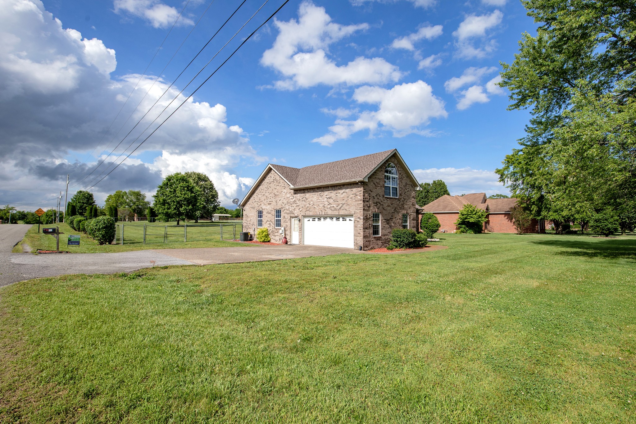 443 Clearview Road Cottontown, TN 37048 - Photo 18 of 21 a front view of a house with garden