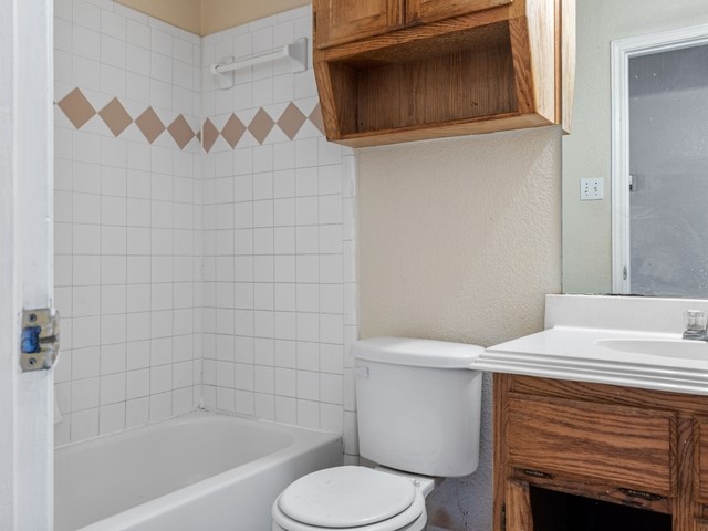 121 Meadowlake Lane Kempner, TX 76539 - Photo 13 of 14 a bathroom with a sink toilet and shower