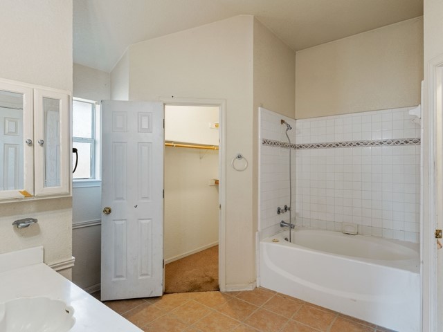 121 Meadowlake Lane Kempner, TX 76539 - Photo 8 of 14 a bathroom with a bathtub and a shower