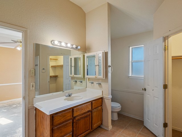 121 Meadowlake Lane Kempner, TX 76539 - Photo 9 of 14 a bathroom with a sink a toilet and shower