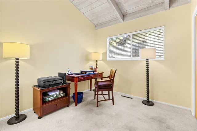 a view of a room with a bathroom