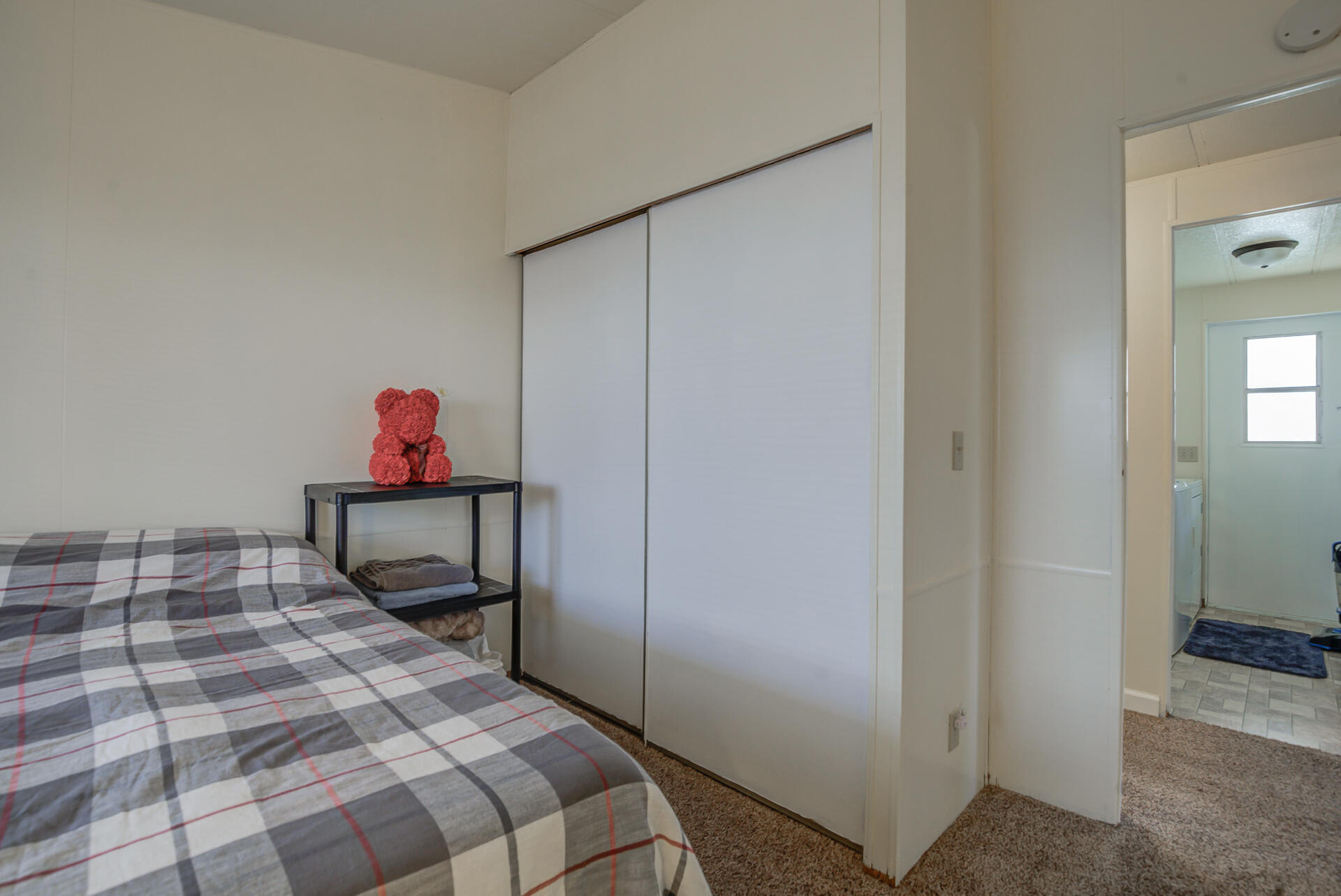 2873 Arcade Redding Ca, Unit STARLITE Redding, CA 96002 - Photo 21 of 32 a bedroom with a bed and a closet