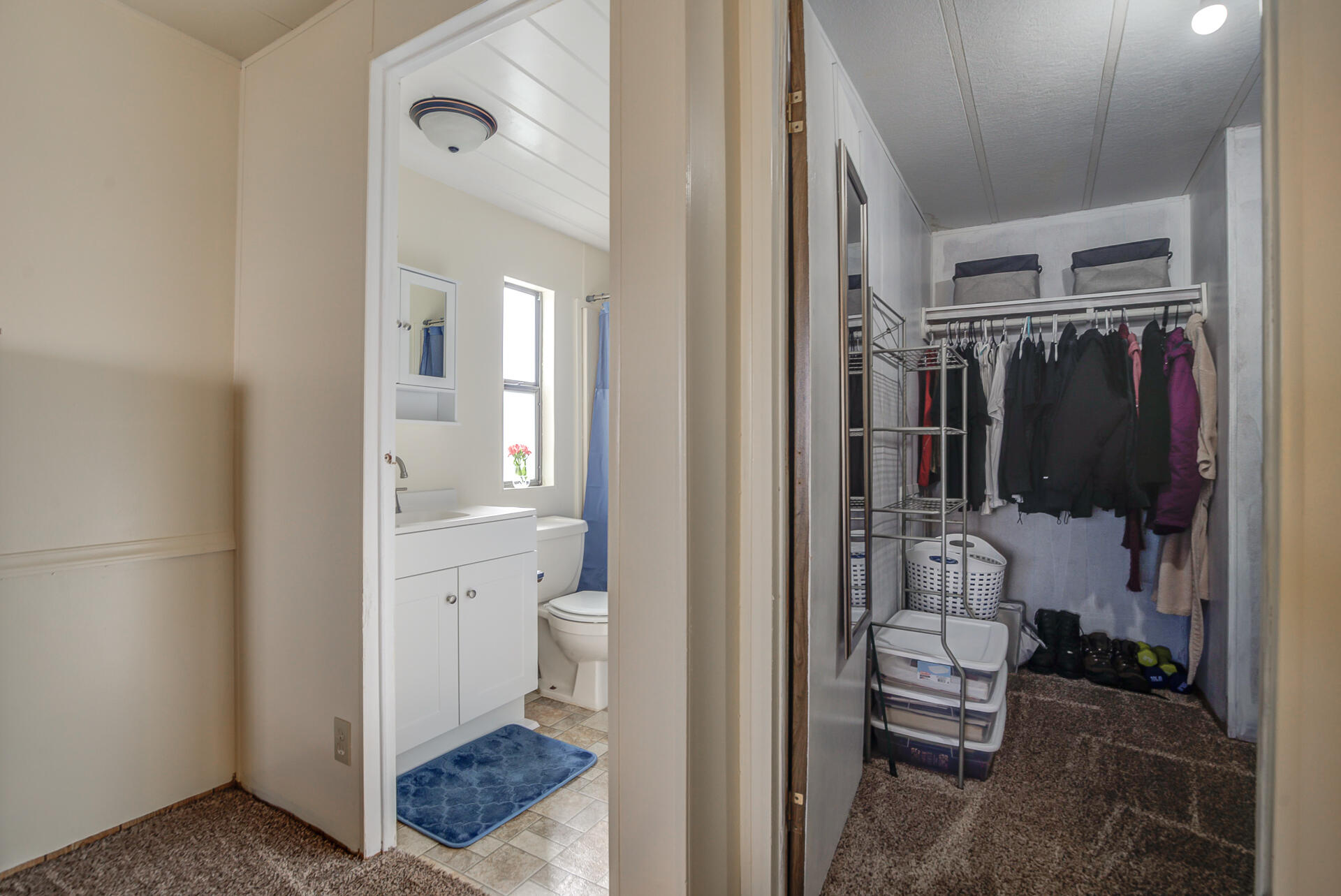 2873 Arcade Redding Ca, Unit STARLITE Redding, CA 96002 - Photo 25 of 32 a bathroom with a granite countertop sink and a toilet