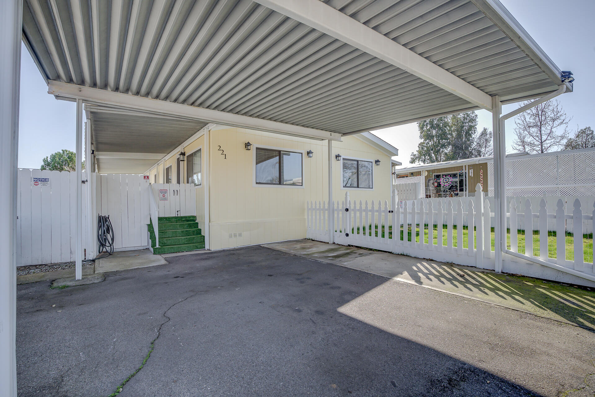 2873 Arcade Redding Ca, Unit STARLITE Redding, CA 96002 - Photo 30 of 32 a view of a house with a backyard