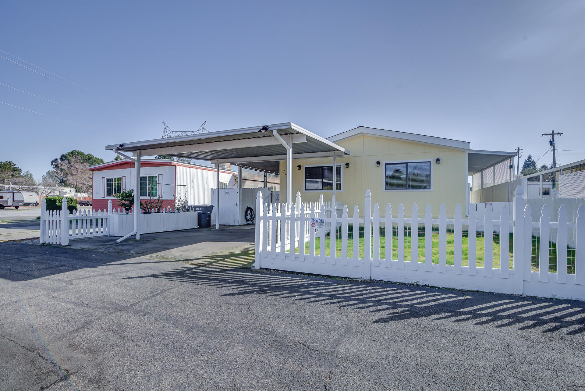 2873 Arcade Redding Ca, Unit STARLITE Redding, CA 96002 - Photo 32 of 32 a view of a house with a porch