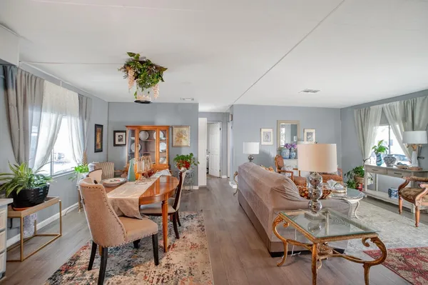 a view of a dining room with furniture window and outside view