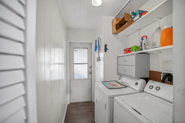 a storage room with washer and dryer