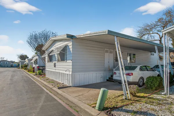 a view of a house with a patio