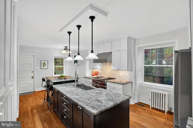 a very nice looking dining room with a table and chairs