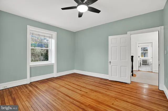 a view of entryway with stairs and windows