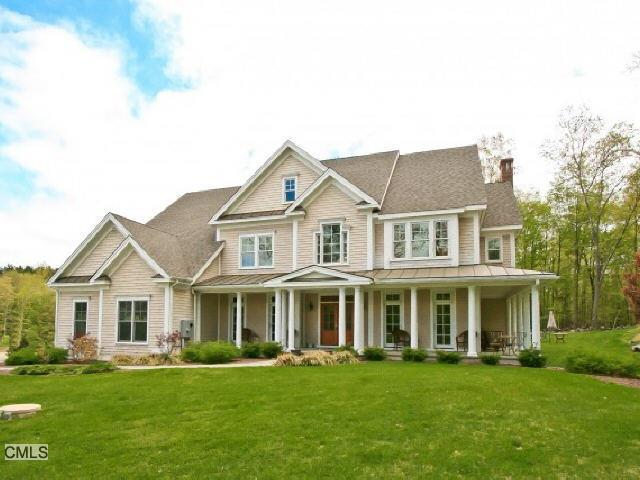 76 George Hull Hill Road Redding, CT 06896 - Photo 1 of 1 a front view of a house with a garden
