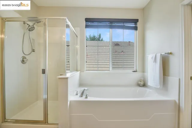 a view of a chairs and tables in patio