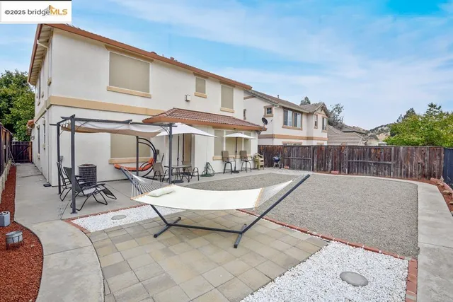 a view of a house with a patio