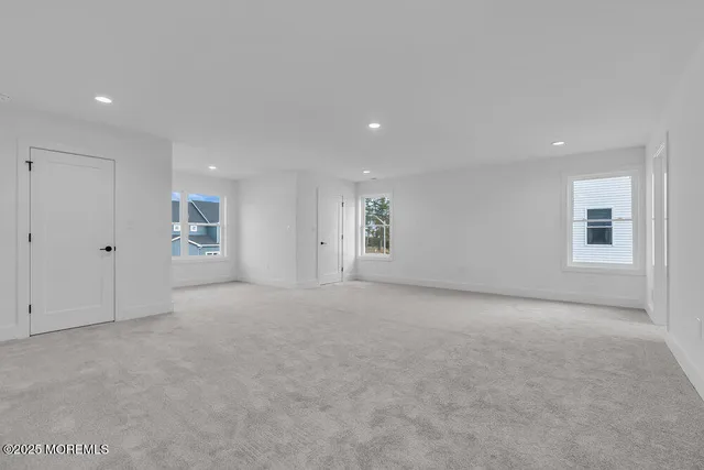 a view of a hallway with front door