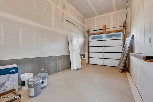 a view of a room with wooden walls