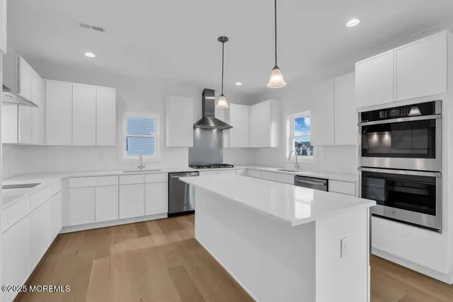 a view of a hallway with staircase