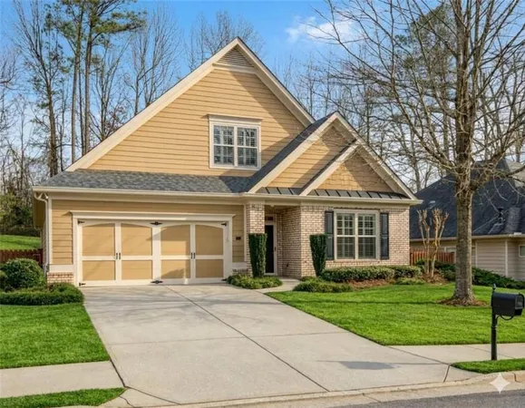 front view of a house and a yard