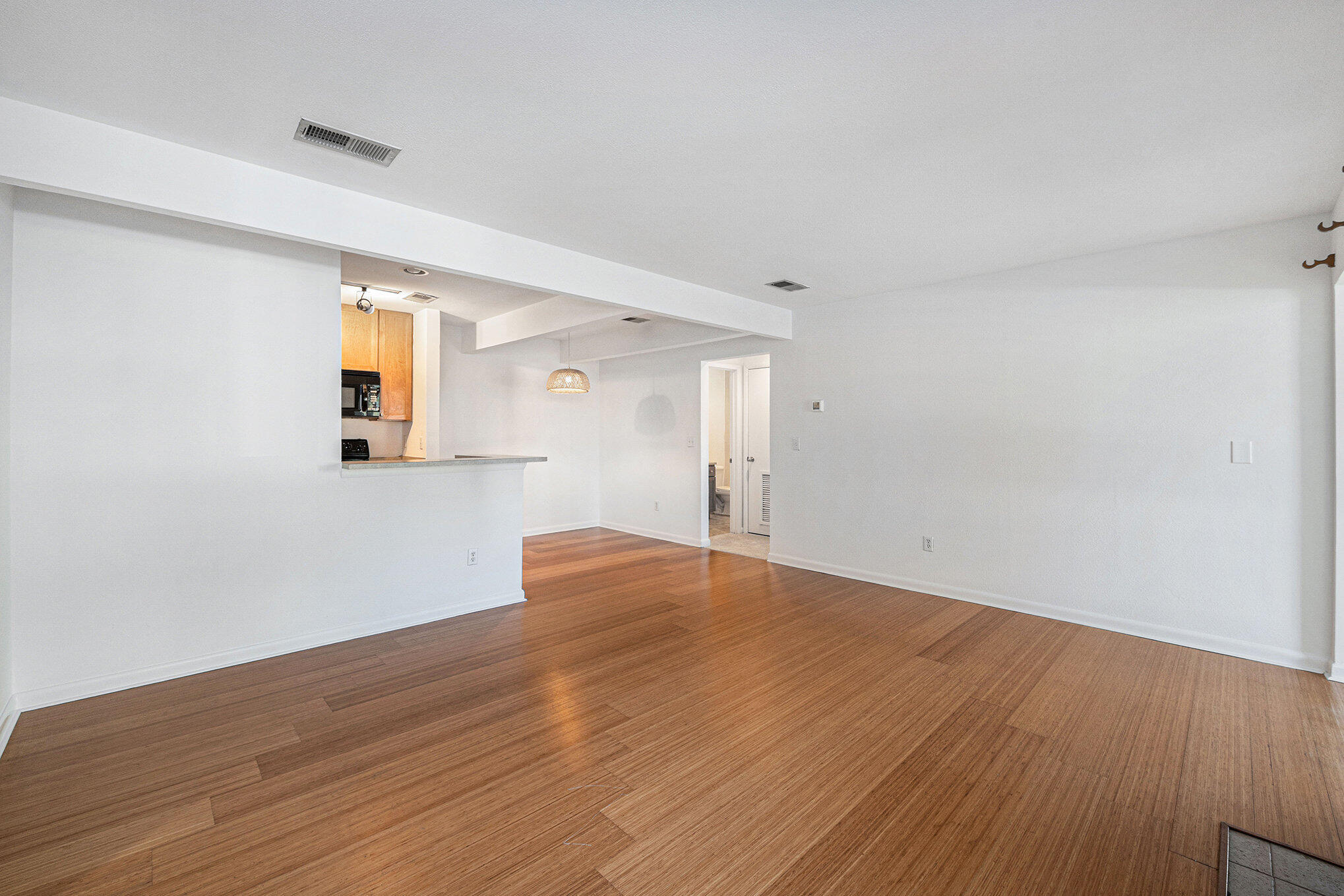 272 Alexandra Drive, Unit 2 Mount Pleasant, SC 29464 - Photo 2 of 27 Den to Kitchen