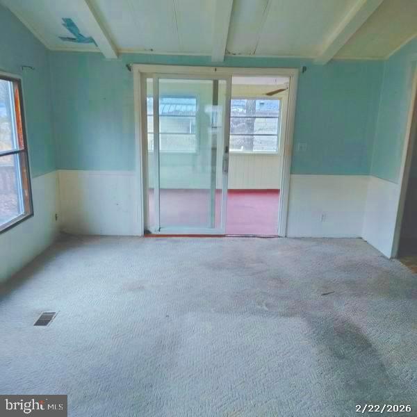 31061 Vacation Road Millsboro, DE 19966 - Photo 4 of 12 a view of an empty room with a window