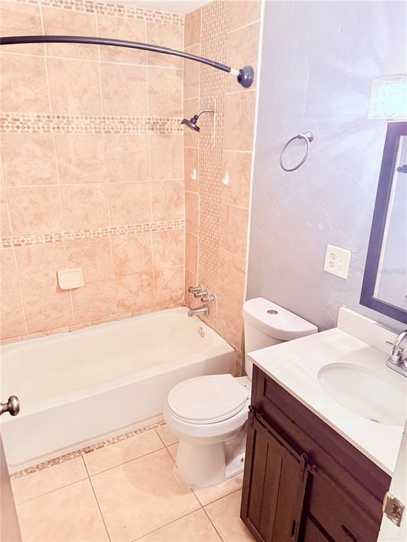 6519 West Newberry Road, Unit 211 Gainesville, FL 32605 - Photo 12 of 20 a bathroom with a sink toilet and shower