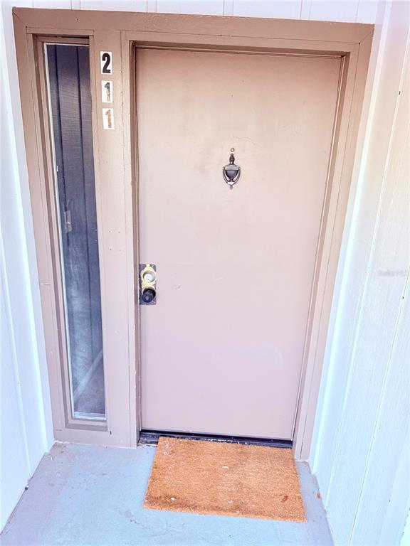 6519 West Newberry Road, Unit 211 Gainesville, FL 32605 - Photo 3 of 20 a view of an front door