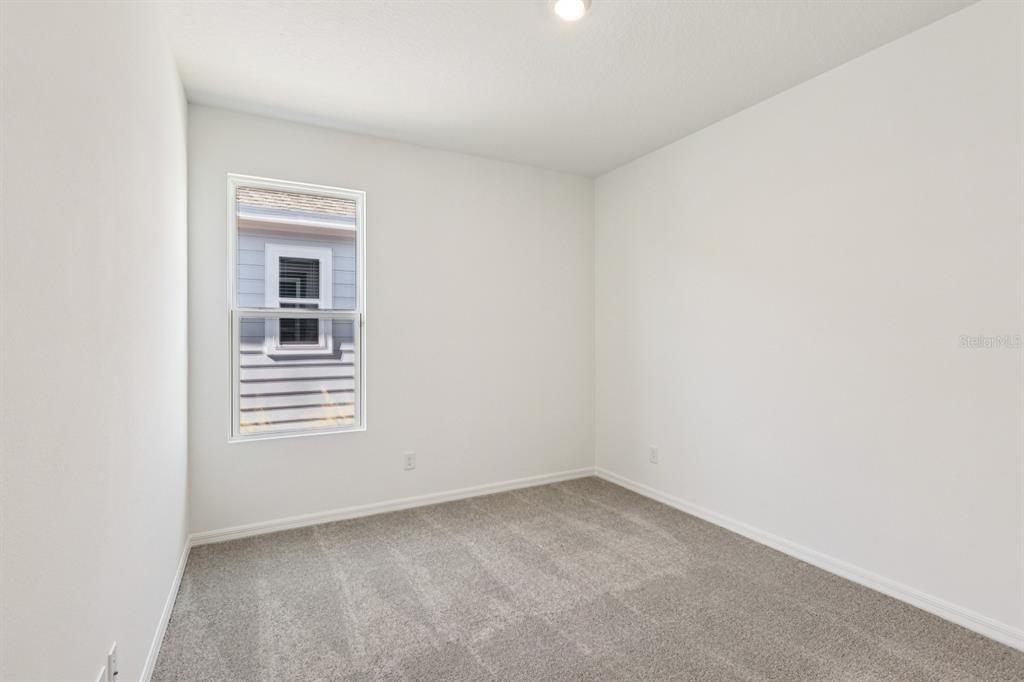 6673 Wake Street St. Cloud, FL 34771 - Photo 20 of 44 a view of empty room with windows