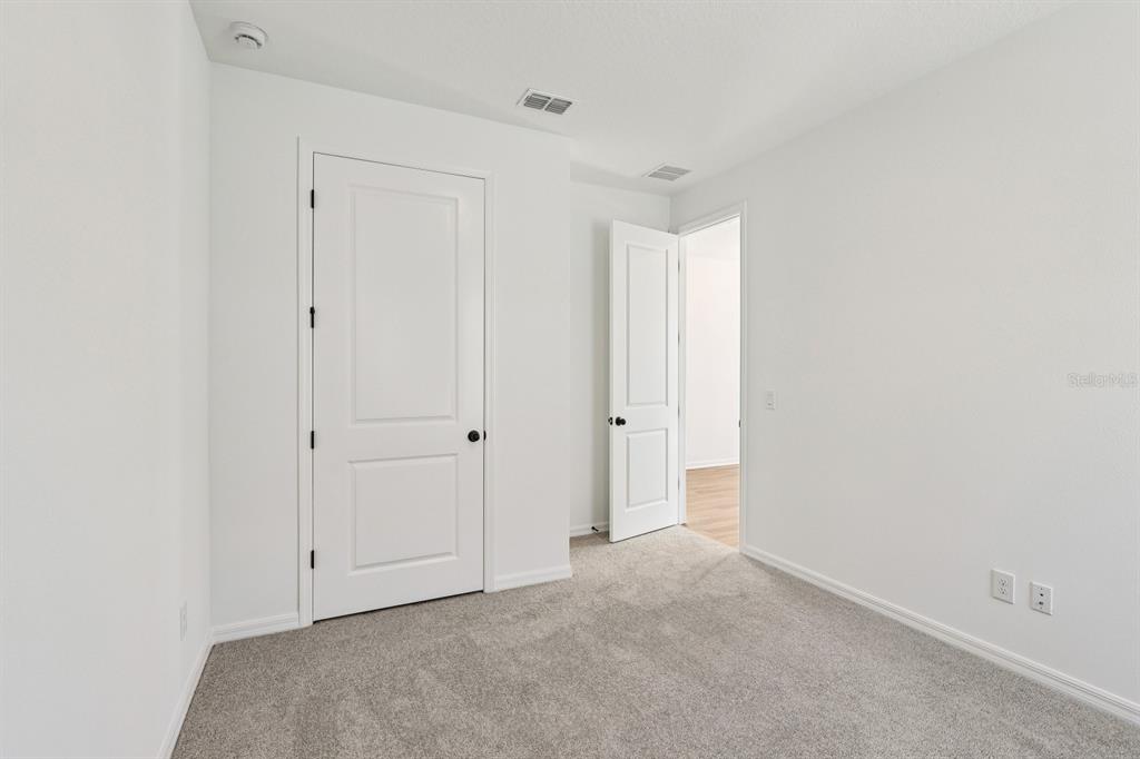 6673 Wake Street St. Cloud, FL 34771 - Photo 21 of 44 a view of an empty room