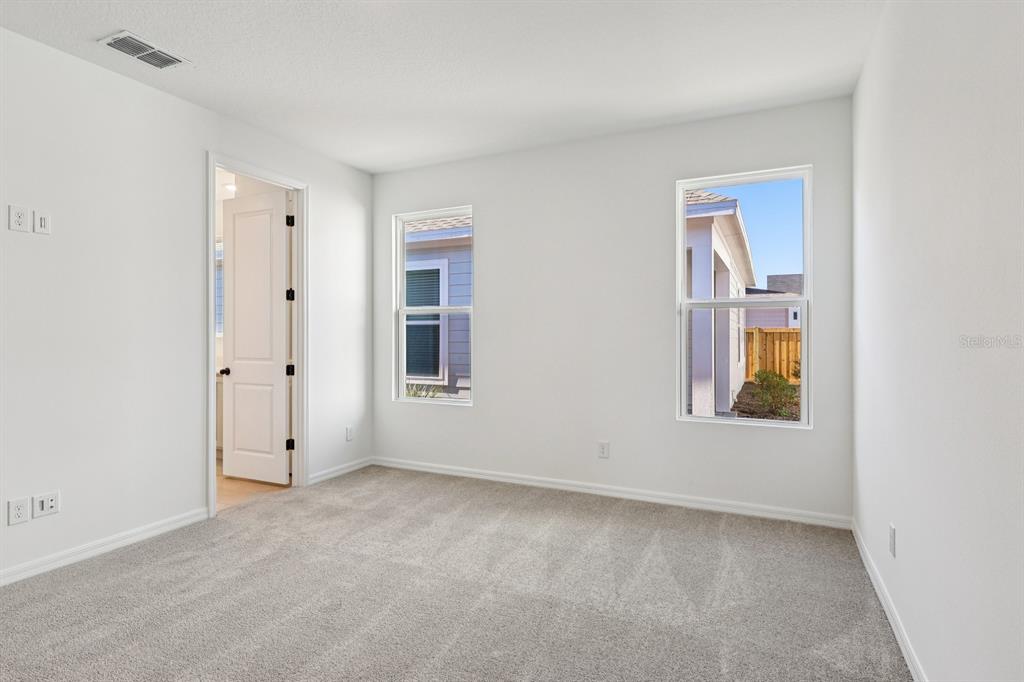 6673 Wake Street St. Cloud, FL 34771 - Photo 24 of 44 a view of an empty room with a window