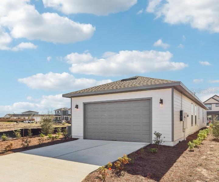 6673 Wake Street St. Cloud, FL 34771 - Photo 37 of 44 a front view of a house with a yard