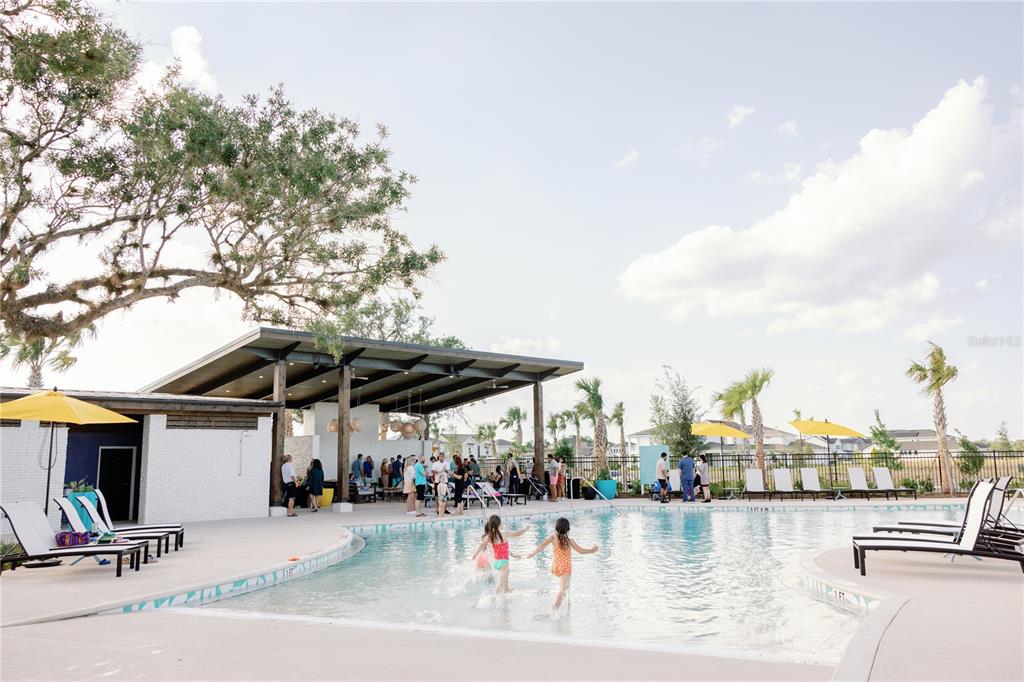 6673 Wake Street St. Cloud, FL 34771 - Photo 39 of 44 a view of a lake with sitting area