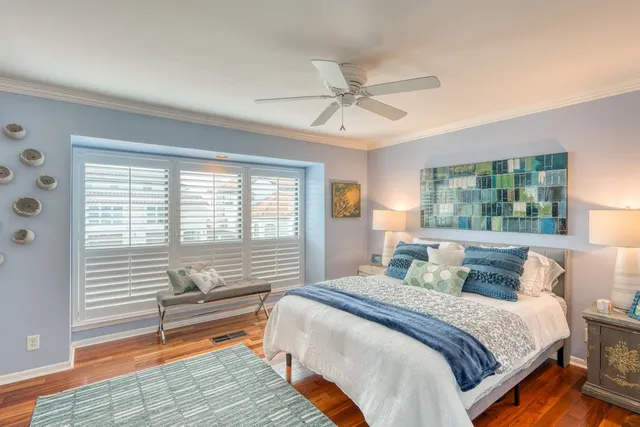 a bedroom with a bed and a walk in closet