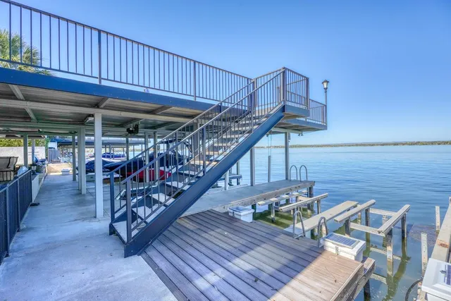 a view of a house with a patio and wooden floor