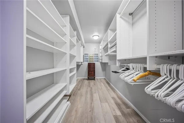 a view of a kitchen with furniture and staircase