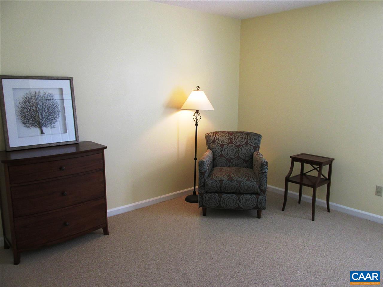 2704 Huntington Road Charlottesville, VA 22901 - Photo 22 of 42 a living room with furniture and a lamp
