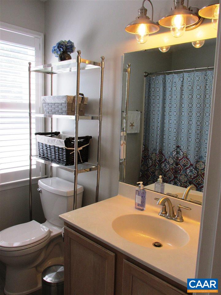 2704 Huntington Road Charlottesville, VA 22901 - Photo 27 of 42 a bathroom with a sink a toilet and shower