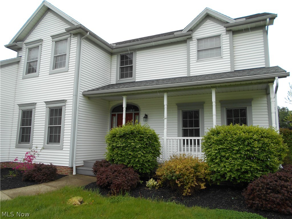 8770 North Kane Road Wadsworth, OH 44281 - Photo 2 of 29 Great front porch, bring your rocking chairs.