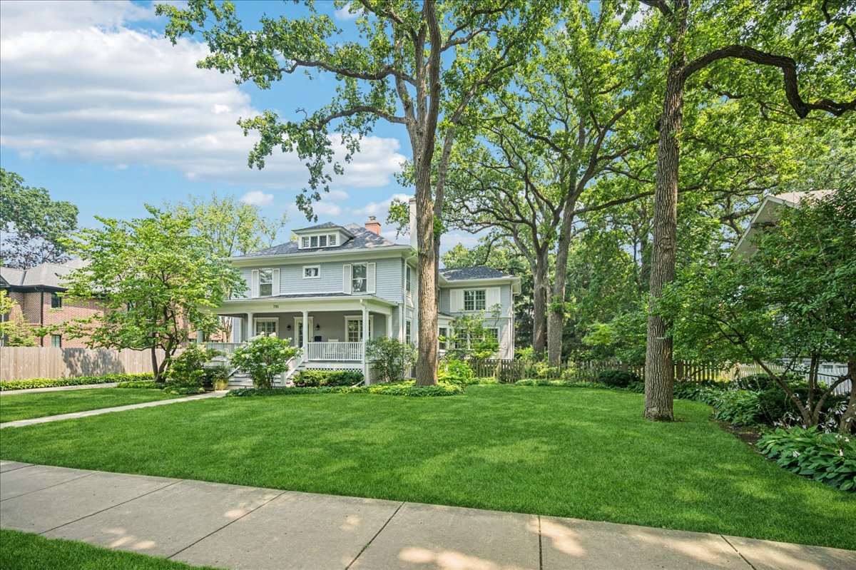 755 Lincoln Avenue Winnetka, IL 60093 - Photo 1 of 52 front view of house with a yard
